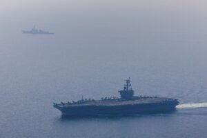 Iran says it struck USS Abraham Lincoln, while U.S. denies carrier was hit
